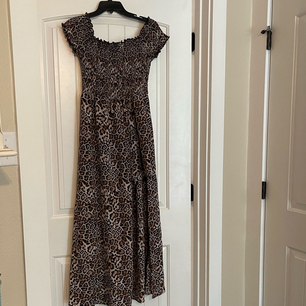 Ladies leopard shorts/skirted jumpsuit/romper. Size large.